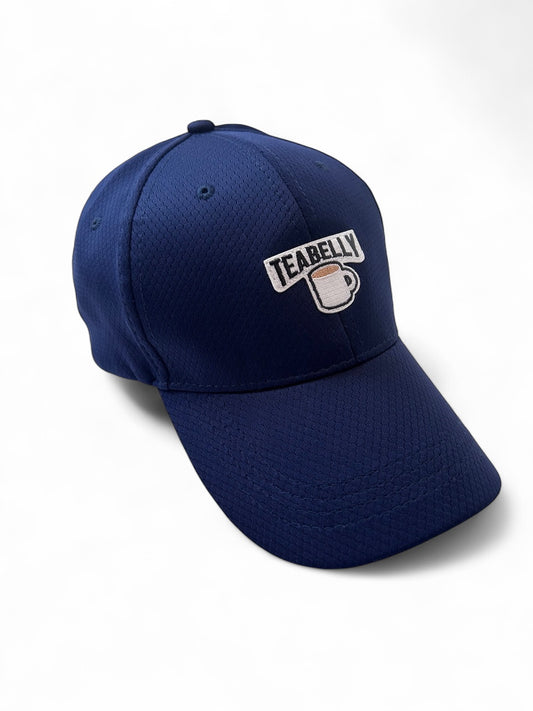 Navy blue cap with Teabelly logo on a white background